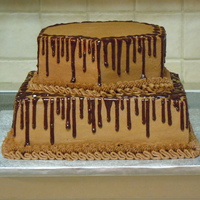 Chocolate, Chocolate, Chocolate 10" square and 8" octagon groom's cake, bride to add a red mustang on top. Chocolate cake, chocolate buttercream, chocolate...