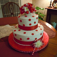 Red Dots 6" 10" Red Velvet, buttercream icing, fondant circles, ribbon and fresh flowers for a bridal shower. Hope they like it!
