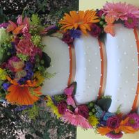 Bright Summer Wedding Bottom layer 12" Lemon with lemon filling. Middle layer 9" Vanilla with Bavarian cream filling. Top layer 6" dark choc. with...