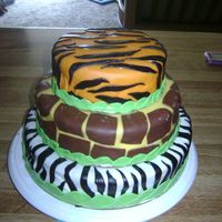 Dsc02443.jpg safari theme baby shower cake made with mmf and also choc. mmf for the giraffe pattern
