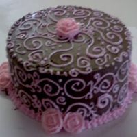 Pink And Brown There are a ton of oopsies on this cake. I wanted to try out Toba Garrett's chocolate buttercream, practice bc roses and scrolls, so...