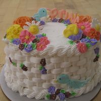 Basketweaved Cake I made this cake for my final course 2 cake. This was my first time doing the basketweaving. It was lemon in the inside and buttercream...