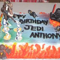 Star Wars this is a carrot cake iced with whipped cream. I used color spray for an extra touch. I topped off the cake with star wars toy.