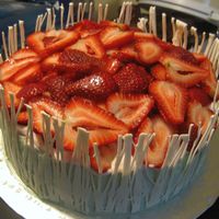 White Chocolate Covered Cake This was my 1st chocolate covered cake. I was inspired by a cake that i seen on a different website. It is a Vanilla torted cake filled...