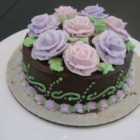 Wilton Class Final Cake This is an all chocolate cake with chocolate icing and buttercream roses.