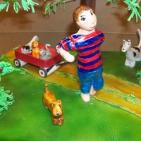 Red Flyer Sheet cake with hand modeled figures, trees, etc. for a red flyer wagon themed baby shower.