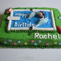 Pool Party Cake This is my first sheet cake attempt. I made it for a little girl's 8th birthday. She loves dolphins and was having her party at the...