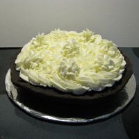 Banana Cream "pie" I tried out a banana cake recipe this week and like it so much I decided to try this with it. It's an 8in round carved to look like a...