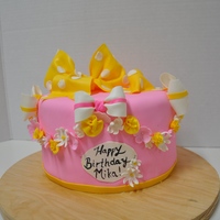 Bows, Flowers And Polkadots Oh My! Done for a 9 year olds birthday, she wanted it to be girly and pink. I think this fits the bill