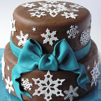 Winter Cake This I made as a desert for a diner party at a period full of snow... So I had a lot of inspiration for the design ;) gum paste snowflakes...