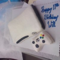 Xbox Console white and chocolate cake and bc icing, im actually very proud of this, turned out beter than i thought