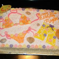 Beach Hawaii Cake Fondant bikini and swim trunks with fondant flowers. Real shells.