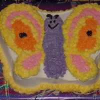 Pretty Butterfly My 6 year old daughter's first decorated cake. I iced the sides and she star tipped and decorated the rest of the cake. She made it...