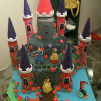 Princess Castle Cake is funfetti, Covered in fondant. Used impression mats for the cobblestone on the castle and brick for the towers. My inspiration came...