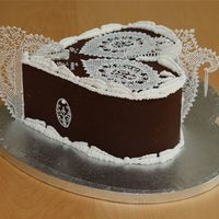 My Passion Decorations with Royal Icing. The cake is a cacao and red wine cake with white chocolate ganache.