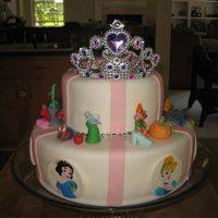 Disney Princess Cake Hand painted pastillage plaques of Jasmine, Belle, Cinderella, Snow White, and Ariel. Gumpaste figures to go with each Princess. This was...