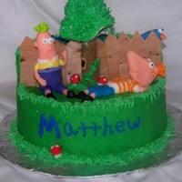Phineaus & Ferb Lots of Fondant.... The boys, fence, Tree Trunk, mushrooms, Perry.Butter cream cake. I LOVED making this cake sooo much fun!!!