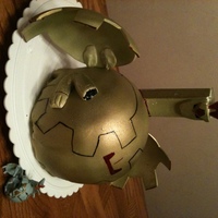 Bakugan Cake This is a second Bakugan cake that we made for our son's birthday. the actual toy is sitting in front of the cake.