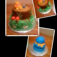 Pooh Bear & Honey Pot Cake This was for my son's 1st birthday. the Honey Pot was his "dig-in" cake (he was a blue mess head to toe, but loved it...lol...