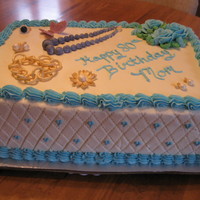 Jewelry Cake 1/4 sheet cake, 1/2 & 1/2, buttercream icing, gumpaste jewelry.