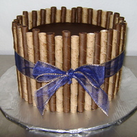 Friend's Bday Cake Chocolate cake with chocolate ganache and cookies. Last minute cake that looked and tasted great! I had the cake frozen and some ganache...