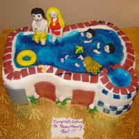 Swiming Pool I made this cake for a pool party. I made all the family on the cake. It was 100% edible, everything was cake. I make the figurines out of...