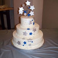 March_09_027.jpg Buttercream with fondant stars and silver dragees.