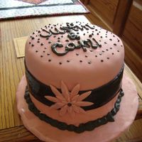 Scrap Cake After making the black & white cake yesterday I had some extra batter & fondant. So I decided to make my frend & her husbad a...