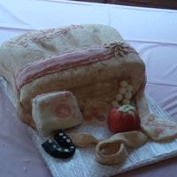 Grandma's Birthday Purse My very first carved cake, had so much fun! Not as scary as I originally thought! A purse cake for my grandma's birthday. Of course...