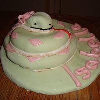 Carved Snake! 6 " round carved cake, chocolate with oreo filling.