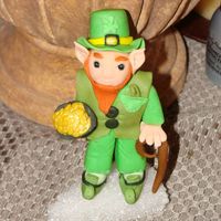 Leprechon This is my little leprechon made of fondant. I will post a photo of the final cake later this week.