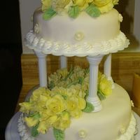 Wilton Fondant Class Cake This was the last cake from course three (Wilton). The cake is covered in fondant and the flowers are also made of fondant.