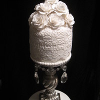Victorian Wedding Cake Three tier Victorian wedding cake with gumpaste roses.