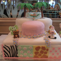 Jungle Jill Baby Shower Cake This baby shower cake was created around the nursery bedding. The base is a 16" square cake (three layers), covered with fondant. The...