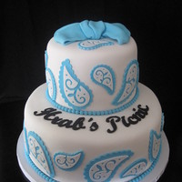 Blue Paisley Cake This cake was made for a picnic. The paisley print and bow are to match the invitation. It's covered and decorated with SI. The...