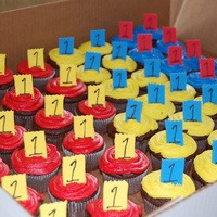 Carnival Cupcakes 50 cupcakes for a carnival themed party. Those are fondant tickets atop each one.