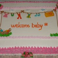 Baby Clothesline Inspiration from the baby shower clothesline cakes posted on CC. Thanks to all. Fondant rose's, leaves and baby clothes.