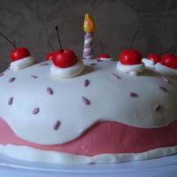 All Fondant Birthday Cake Strawberry fondant with white cake and lemon filling.