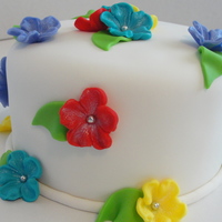 Tropical Flowers This is a 6inch pina colada cake with pineapple filling. TFL
