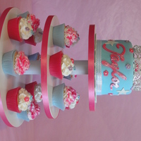 Princess Birthday Cupcake Tower WASC cake and cupcakes with strawberry filling. The name and the stars were done with the cricut cake. TFL