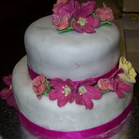 Wilton Course 3 Final Cake This is my final cake for my last wilton class. The bottom layer is lemon cake with regular buttercream, the top layer is chocolate with...