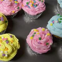 100_0722.jpg Here are some cupcakes that I made for a March of Dimes fundraiser.Buttercream with sprinkles. Thanks for looking!