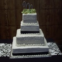 Simple But Elegant This was my forth wedding cake to do. By far the easiest.