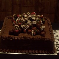 Yummy Groom's cake. Butter cream with chocolate covered strawberries.