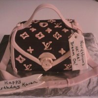Purse Cake Louis Vuitton purse cake with Nordstroms price tag was done as a joke for client's sister. Chocolate cake with chocolate ganache...
