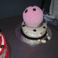 Main Wedding Cake So this is a wedding cake that I did for a friend that had a reception at a bowling alley. The bowling ball cakes were my favorite!! They...