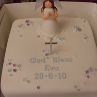Communion Cake - Girl A first holy communion cake, the little girl wanted blue and purple as they were her favourite colours. I made the figure myself and was...
