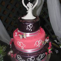 Pink Wedding Cake This was all cake done in red velvet, with a buttercream icing and choc fondant.....TFL