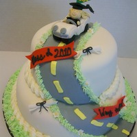 Graduation Cake "off To College" covered in MMF, car and diplomas made of fondant.