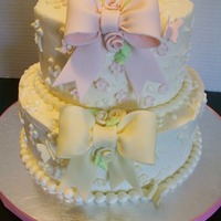 Pastel Bows And Butterflies 6" & 8" covered in BC. Bows, flowers & butterflies are gumpaste.